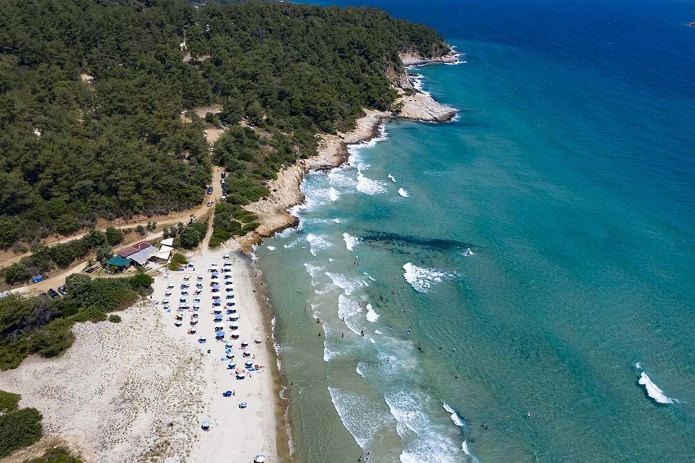 Crystal-clear waters at Thassos Beach in summer - one reason to visit Kavala.